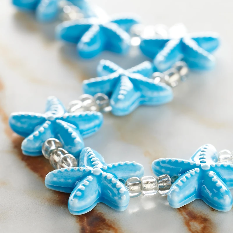 12 Packs: 9 ct. (108 total) Turquoise Starfish Ceramic Beads, 18mm by Bead Landing™