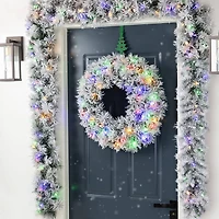 Glitzhome® 9ft Pre-Lit Snow Flocked Greenery Pine Christmas Garland with Timer