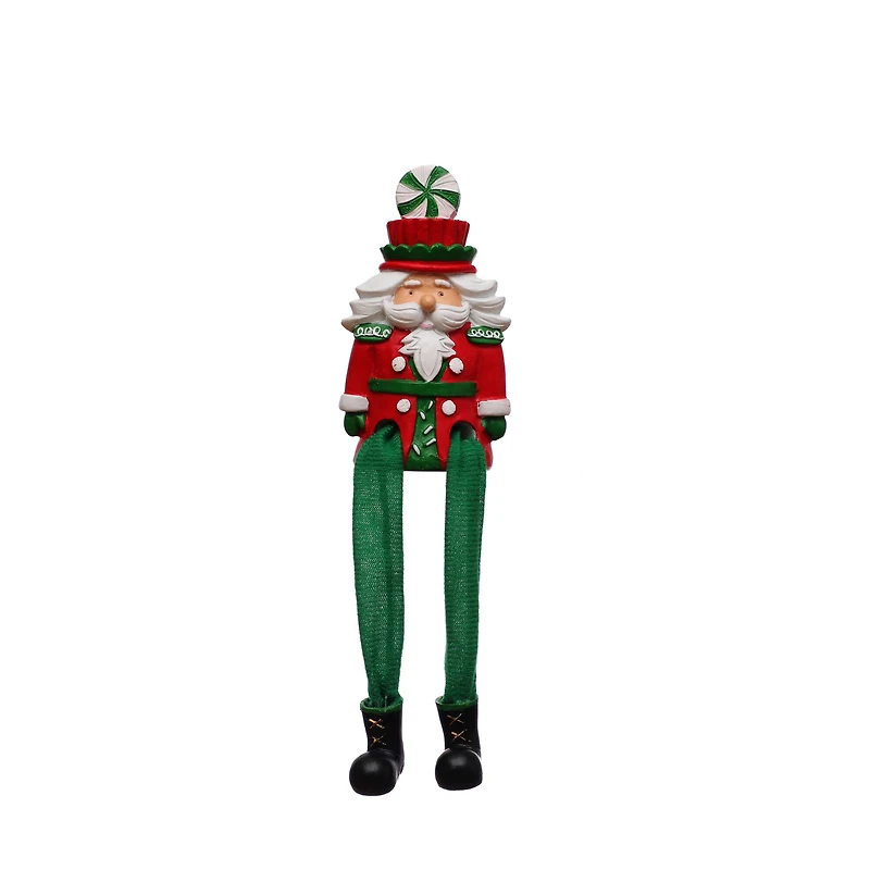 4.25" Sitting Green & Red Nutcracker Dangle Legs Tabletop Décor by Ashland®