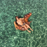 PoolCandy RealPrint® T-Rex Dinosaur Jumbo Pool Tube