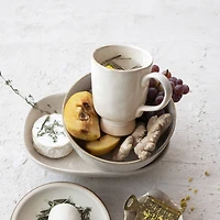 Hello Honey® 4.75" Cream Speckled Glaze Stoneware Footed Mug, 4ct.