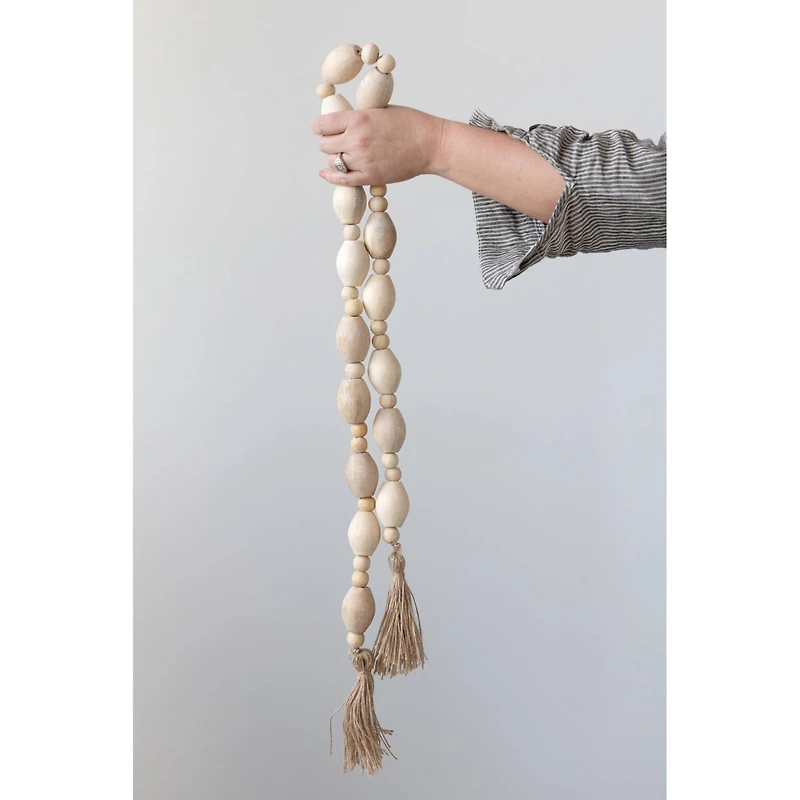 Hello Honey® 60" Mango Wood Bead Garland with Jute Tassels