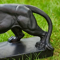 Glitzhome® 24.5" Walking Lion Garden Statue