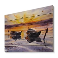 Designart - Sunset and Two Small Boats Parking On The Shore