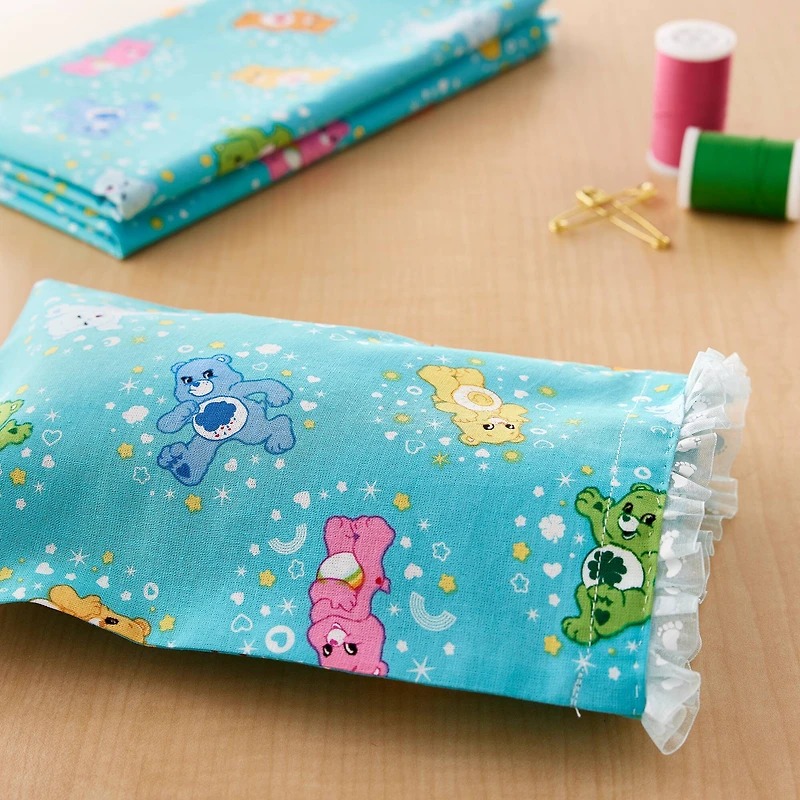 Camelot® Fabrics Care Bears™ Turquoise Belly Badge Cotton Fabric