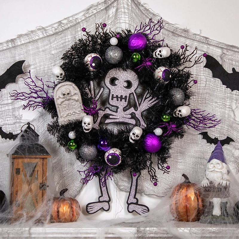 24'' Unlit Purple and Black Spooky Skeleton Pine Halloween Wreath