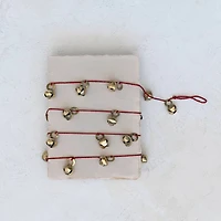 Hello Honey® 6ft. Antique Gold Finish Metal Bells on Red Cord Garland
