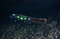 Pool Central® 6ft. White LED Lighted Inflatable Swimming Pool Noodle Toy