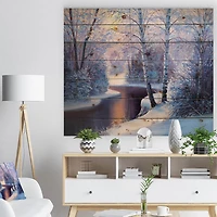 Designart - Winter Forest in River Sunset