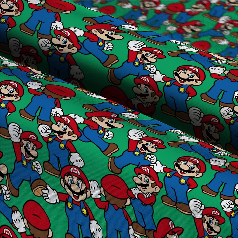 Nintendo® Mario on Green Background Cotton Fabric