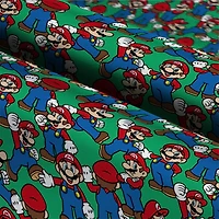 Nintendo® Mario on Green Background Cotton Fabric