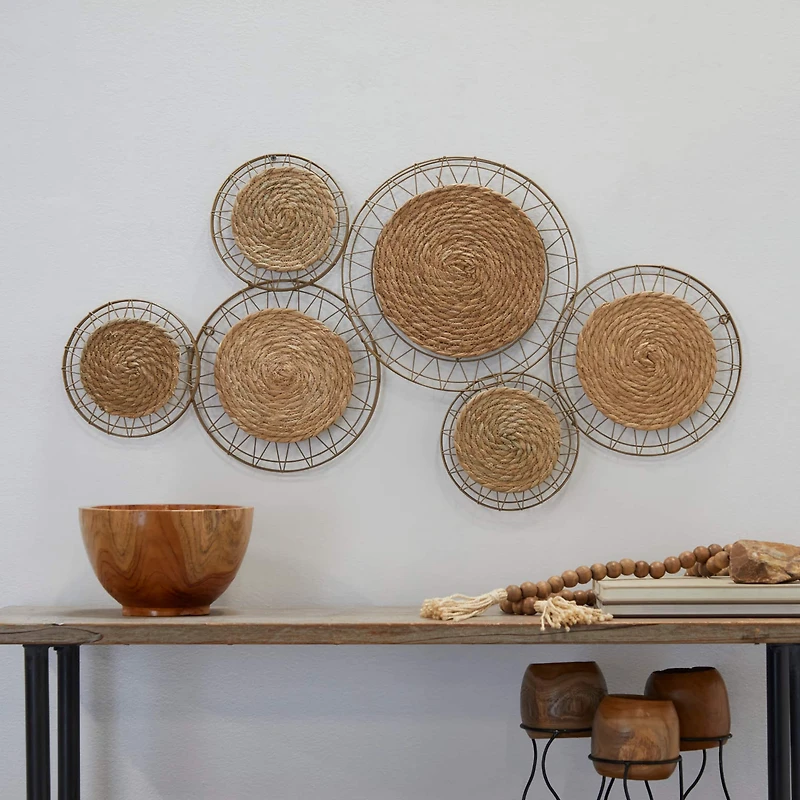 The Novogratz Brown Dried Plant Handmade Woven Plate Wall Decor with Intricate Patterns 40" x 2" x 21"