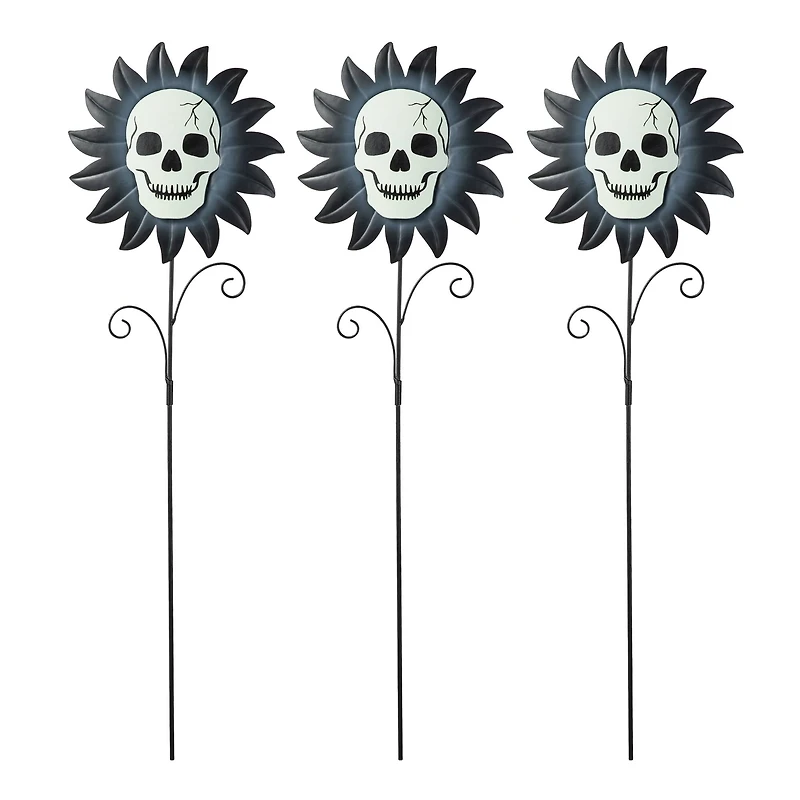 Glitzhome® 24" Halloween Metal Sunflower Skulls Glow-in-Dark Yard Stakes, 3ct.