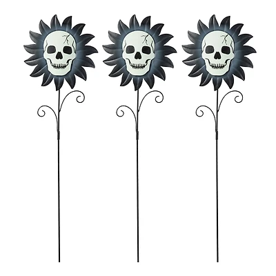 Glitzhome® 24" Halloween Metal Sunflower Skulls Glow-in-Dark Yard Stakes, 3ct.