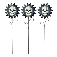 Glitzhome® 24" Halloween Metal Sunflower Skulls Glow-in-Dark Yard Stakes, 3ct.