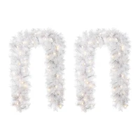 Glitzhome® 6ft Pre-Lit Snow Flocked White Pine Christmas Garland with Timer, 2ct.