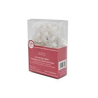 18ct. Warm White LED White Snowflake String Lights on Silver Wire by Ashland®