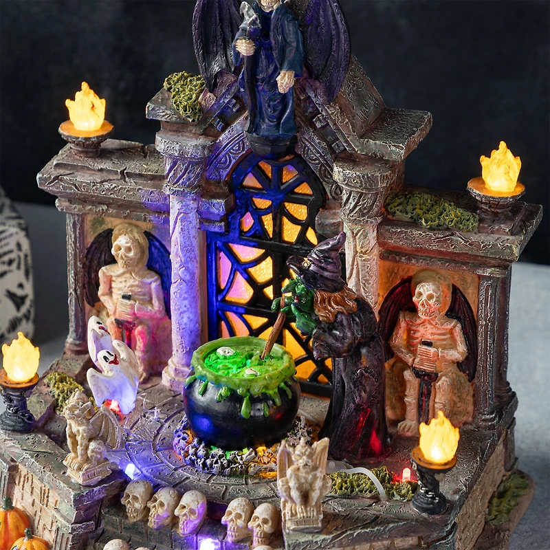 Glitzhome® 9.75"H Lighted Resin Halloween Haunted House Village