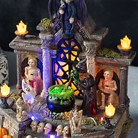 Glitzhome® 9.75"H Lighted Resin Halloween Haunted House Village