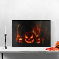 LED Lighted Jack-O-Lanterns in a Cemetery Halloween Canvas Wall Art