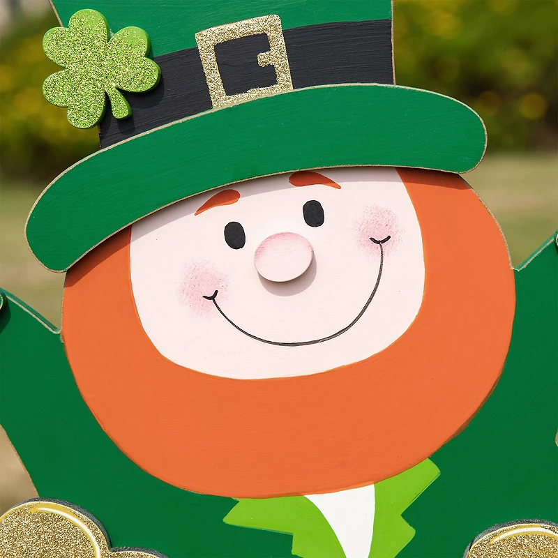 Glitzhome® 24" Lighted St. Patrick's Wooden Leprechaun Pot of Gold Décor