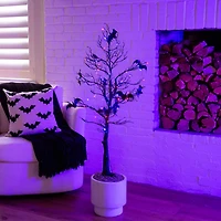 4ft. Pre-Lit Artificial Halloween Black Spooky Twig Tree with Bats and 120 Orange & Purple LED Lights
