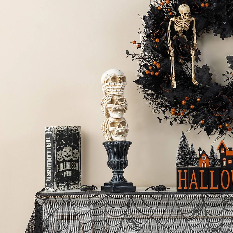 Glitzhome® 18"H Halloween Resin Stacked Skull Table Decor