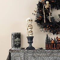 Glitzhome® 18"H Halloween Resin Stacked Skull Table Decor
