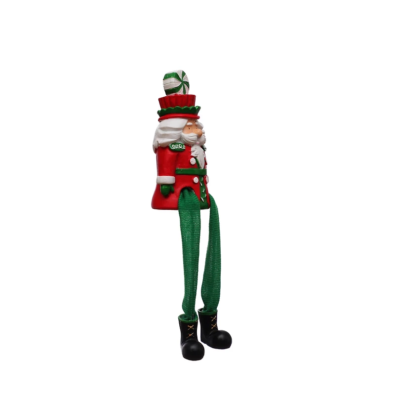 4.25" Sitting Green & Red Nutcracker Dangle Legs Tabletop Décor by Ashland®