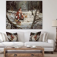 Designart - Santa Claus with deer in snowy woods