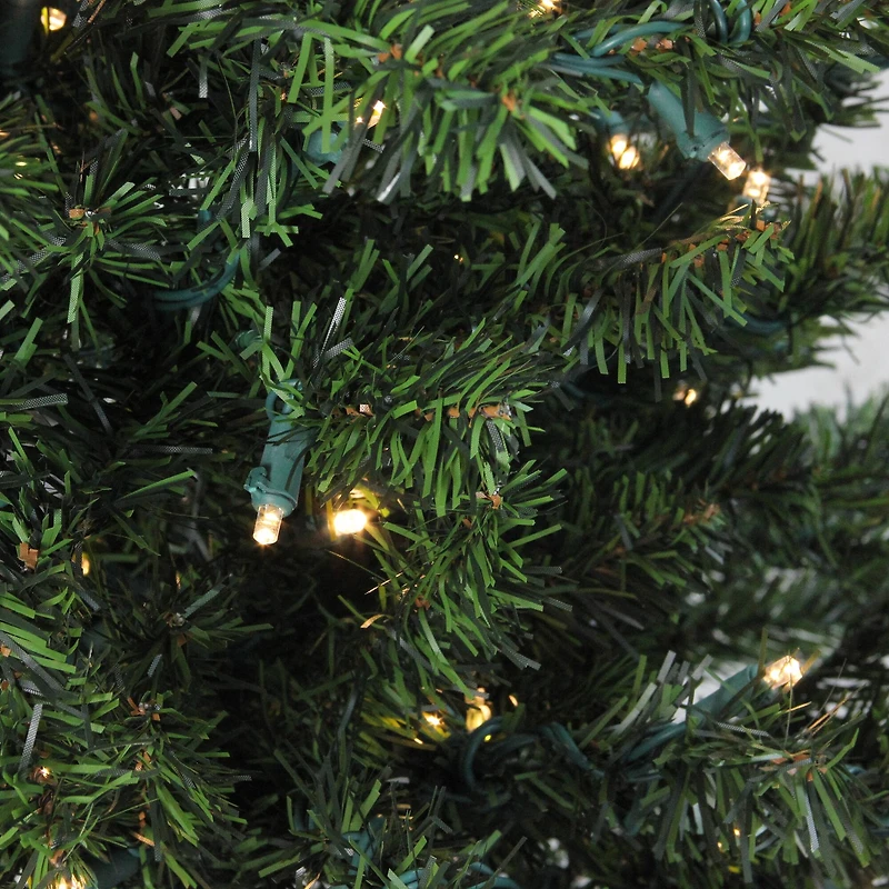 4ft. Pre-Lit Medium Canadian Pine Artificial Christmas Tree with Candlelight LED Lights