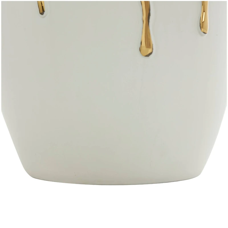 CosmoLiving by Cosmopolitan 13" White Ceramic Vase with Abstract Gold Melting Drips