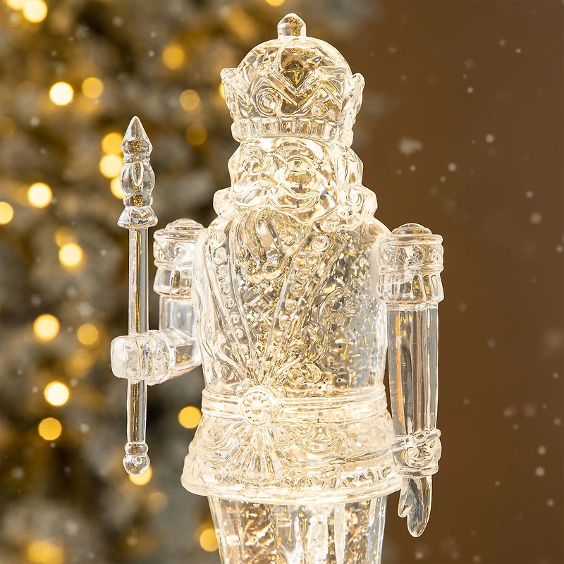Glitzhome® 12.5" Lighted Acrylic Crystal Nutcracker Figurine Waterglobe