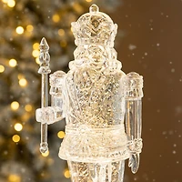 Glitzhome® 12.5" Lighted Acrylic Crystal Nutcracker Figurine Waterglobe