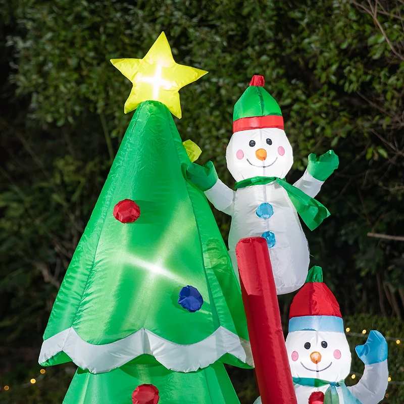 Glitzhome® 8ft. Lighted Inflatable Xmas Snowman Climbing Up Tree Décor