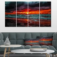 Designart - Red Sunset over Blue Waters
