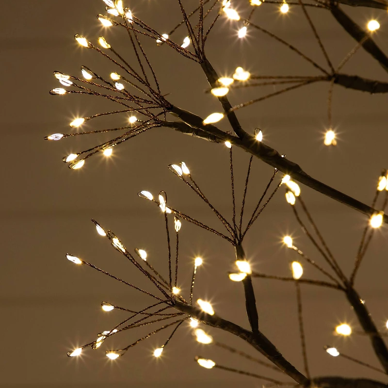 6ft. Pre-Lit Artificial Halloween Black Starburst Tree with 1680 Fairy Warm White LED Lights