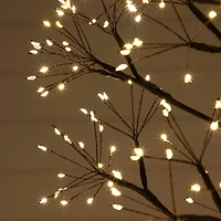 6ft. Pre-Lit Artificial Halloween Black Starburst Tree with 1680 Fairy Warm White LED Lights