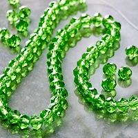 12 Pack: Green Faceted Glass Rondelle Beads, 6mm by Bead Landing™
