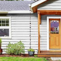 Glitzhome® 8.5ft. Faux Copper Lotus Flower & Bell Rain Chain