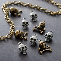 12 Packs: 10 ct. (120 total) Found Objects™ Skull Charms by Bead Landing™