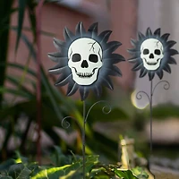 Glitzhome® 24" Halloween Metal Sunflower Skulls Glow-in-Dark Yard Stakes, 3ct.