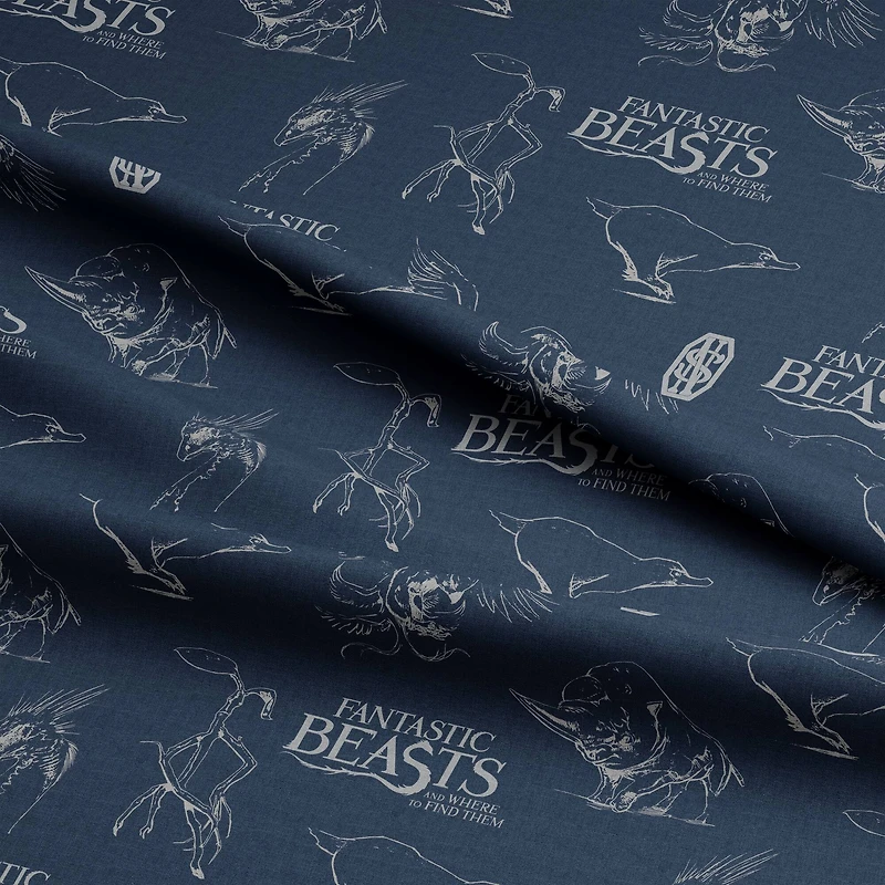 Harry Potter™ Metallic Fantastic Beasts™ Logo & Creatures on Navy Cotton Fabric