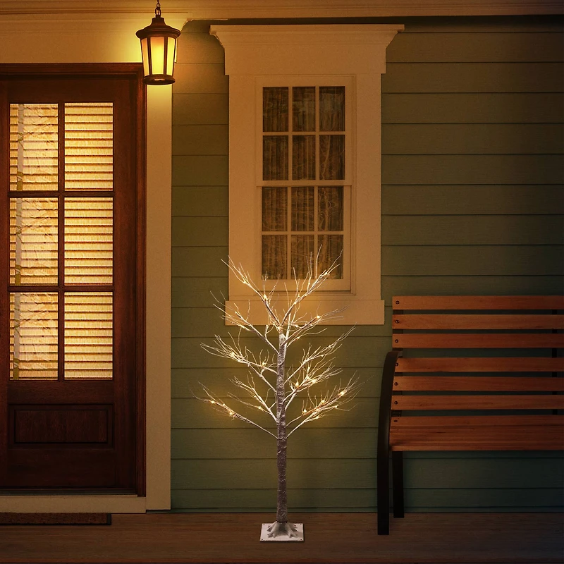 4ft. Pre-Lit Flocked Brown Artificial Twig Tree, White Lights