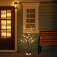 4ft. Pre-Lit Flocked Brown Artificial Twig Tree, White Lights