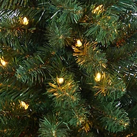 4.5ft. Pre-Lit Northern Rocky Spruce Artificial Christmas Tree in Tower Planter, Clear Lights