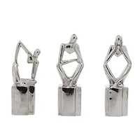 CosmoLiving by Cosmopolitan Silver Ceramic Sculpture Set