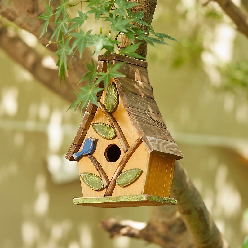 Glitzhome® 9.5" Yellow Distressed Wood Birdhouse with Leaves