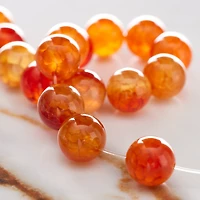 12 Pack: Amber Dyed Fire Agate Round Beads, 10mm by Bead Landing™