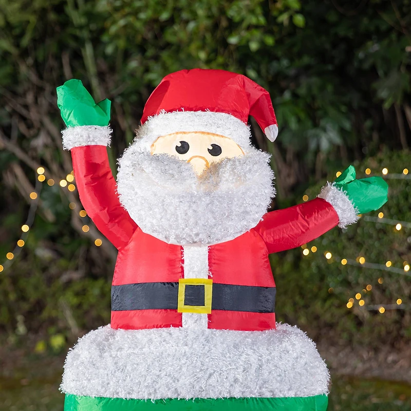 Glitzhome® 8ft. Lighted Inflatable Santa On Pick-Up Train Décor